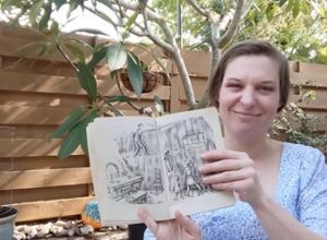 Palmetto Historical Park curator, Tori Chasey, reading "Strawberry Girl" by Lois Lenski